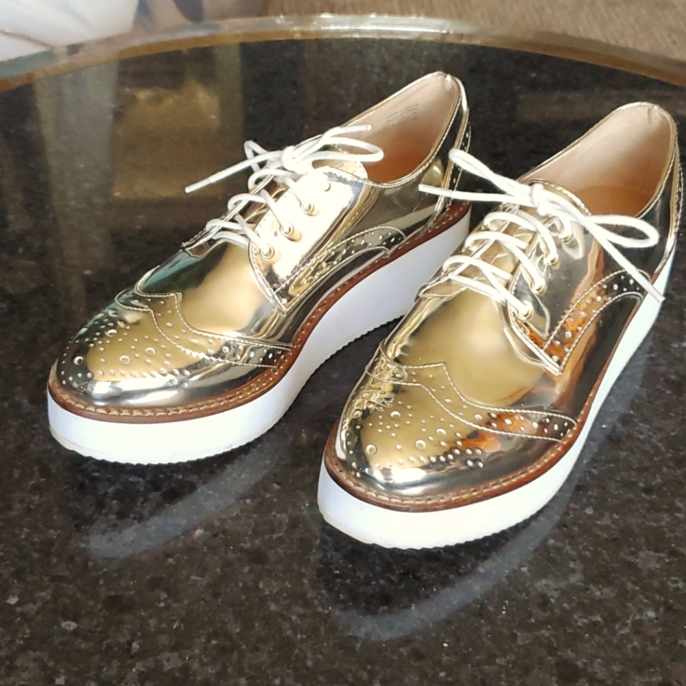 Aldo Gold Wingtip Platforms